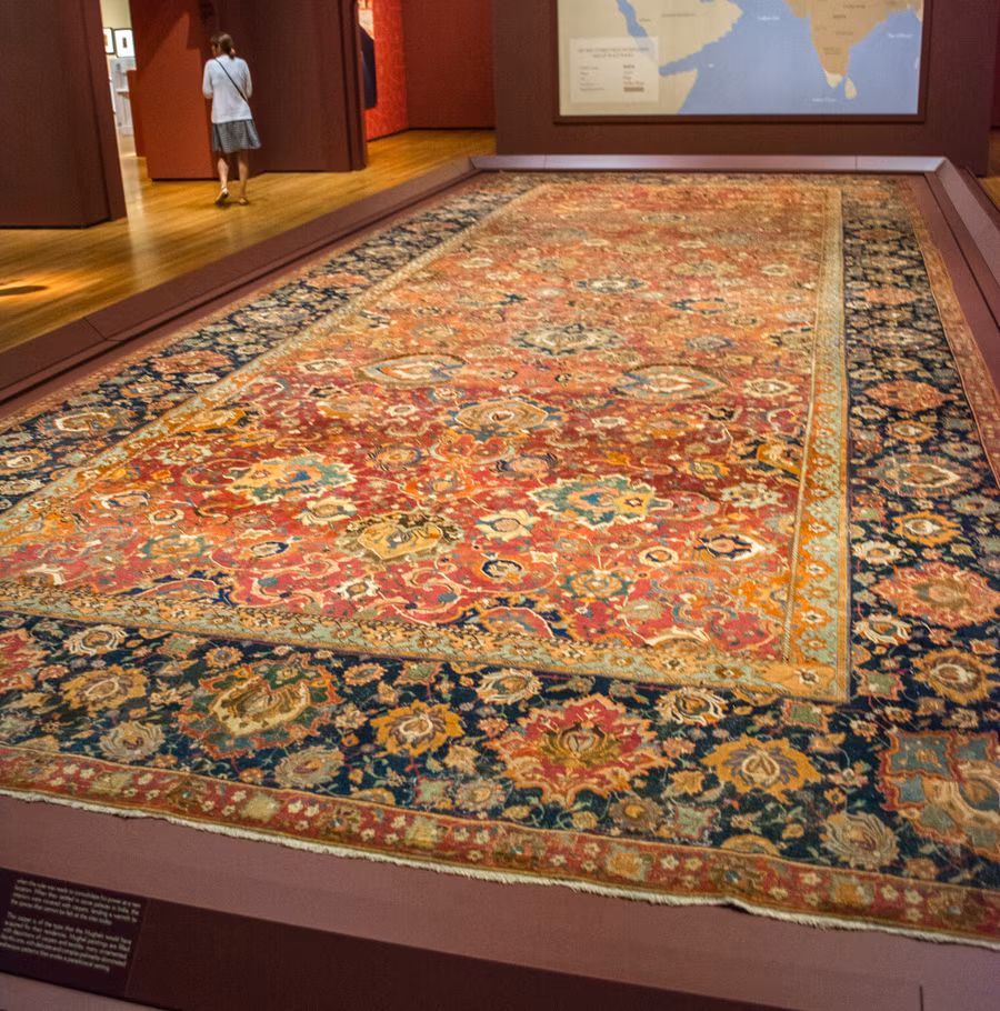 A 16th-century carpet from western Afghanistan with arabesque and palmette patterns, on display at the Cleveland Museum of Art