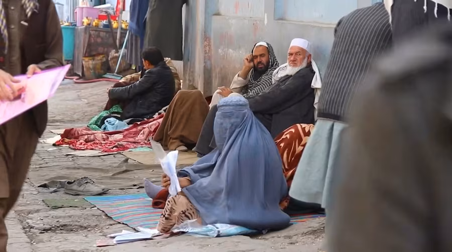 Family members accompanying patients waiting outside Rabia Balkhi Hospital in Kabul