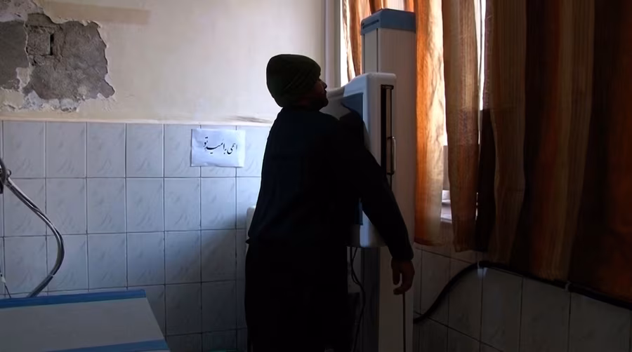 A patient having an X-ray at Ali Abad Hospital in Kabul